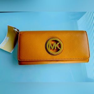 Michael Kors fold over leather wallet in tan NWT